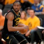 San Francisco, California, USA; Golden State Warriors forward Jonathan Kuminga (00) holds onto the ball against the Minnesota Timberwolves in the fourth quarter during game four of the second round for the 2025 NBA Playoffs at Chase Center. Mandatory Credit: Cary Edmondson-Imagn Images