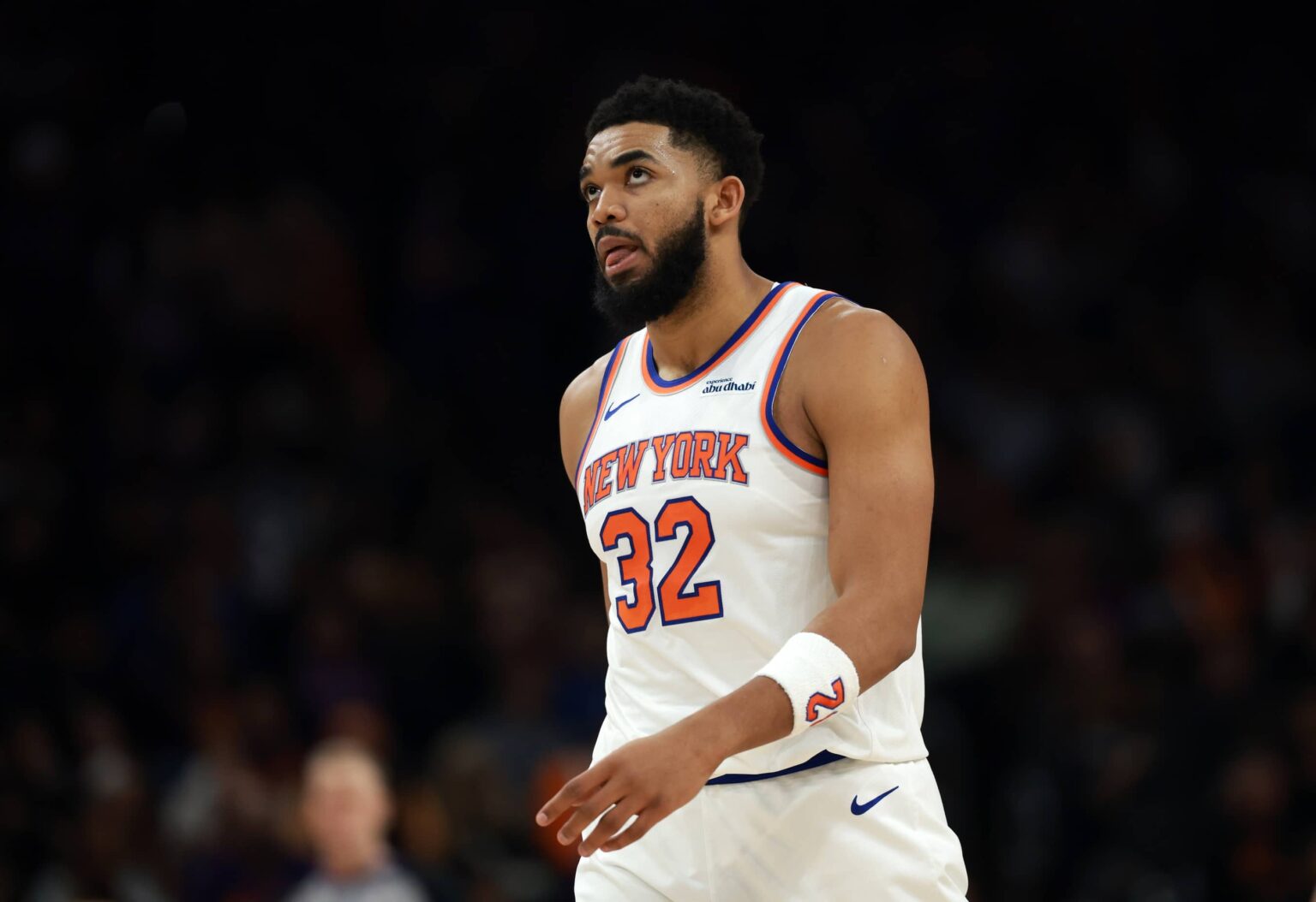 Phoenix, Arizona, USA; New York Knicks center Karl-Anthony Towns (32) reacts against the Phoenix Suns in the first half at Mortgage Matchup Center. Mandatory Credit: Mark J. Rebilas-Imagn Images