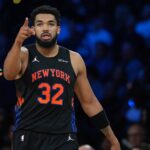Las Vegas, Nevada, USA; New York Knicks center Karl-Anthony Towns (32) reacts against the San Antonio Spurs during the Emirates NBA Cup Final at T-Mobile Arena. Mandatory Credit: Kirby Lee-Imagn Images