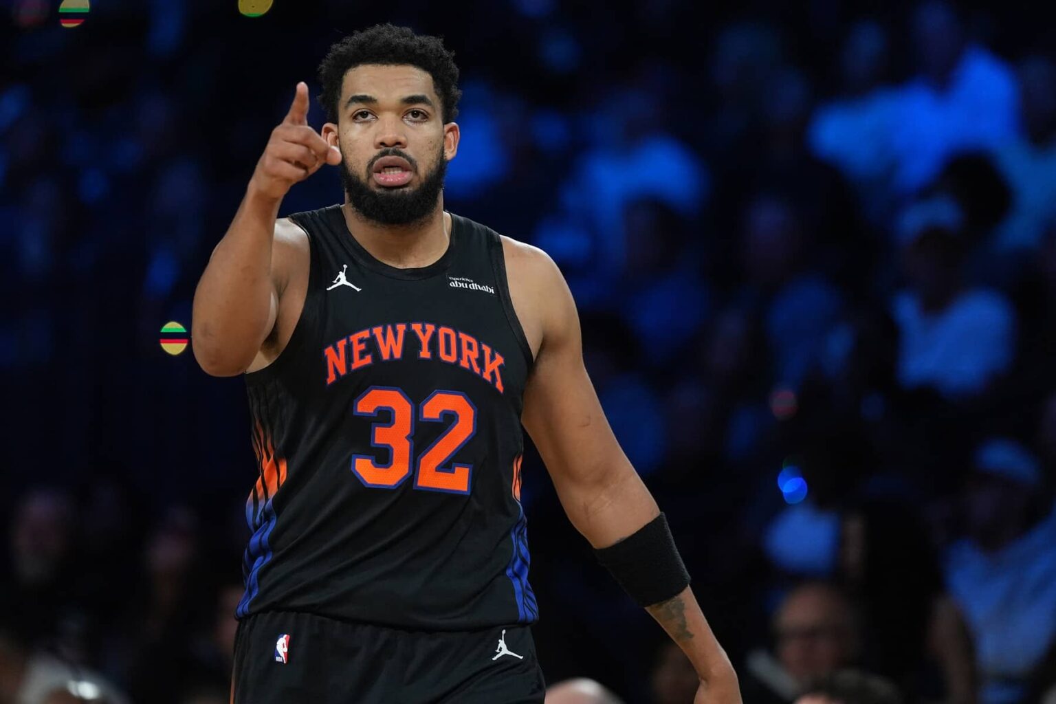 Las Vegas, Nevada, USA; New York Knicks center Karl-Anthony Towns (32) reacts against the San Antonio Spurs during the Emirates NBA Cup Final at T-Mobile Arena. Mandatory Credit: Kirby Lee-Imagn Images