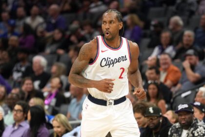 Sacramento, California, USA; Los Angeles Clippers forward Kawhi Leonard (2) reacts after making a three point basket against the Sacramento Kings during the second quarter at Golden 1 Center. Mandatory Credit: Darren Yamashita-Imagn Images