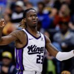 Denver, Colorado, USA; Sacramento Kings guard Keon Ellis (23) reacts after a basket in the third quarter against the Denver Nuggets at Ball Arena. Mandatory Credit: Isaiah J. Downing-Imagn Images
