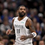 Dallas, Texas, USA; Dallas Mavericks guard Kyrie Irving (11) runs back up the court during the second half against the Minnesota Timberwolves at the American Airlines Center. Mandatory Credit: Jerome Miron-Imagn Images