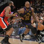 Inglewood, California, USA; Los Angeles Lakers forward LeBron James (23) is defended by Los Angeles Clippers guard James Harden (1) in the second half at Intuit Dome. Mandatory Credit: Jayne Kamin-Oncea-Imagn Images