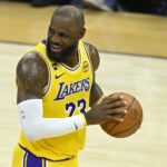 Cleveland, Ohio, USA; Los Angeles Lakers forward LeBron James (23) reacts before shooting a free throw in the second quarter against the Cleveland Cavaliers at Rocket Arena. Mandatory Credit: David Richard-Imagn Images