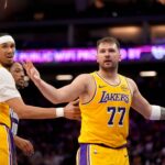Sacramento, California, USA; Los Angeles Lakers guard Luka Doncic (77) looks towards an official after scoring a basket against the Sacramento Kings in the second quarter at the Golden 1 Center. Mandatory Credit: Cary Edmondson-Imagn Images