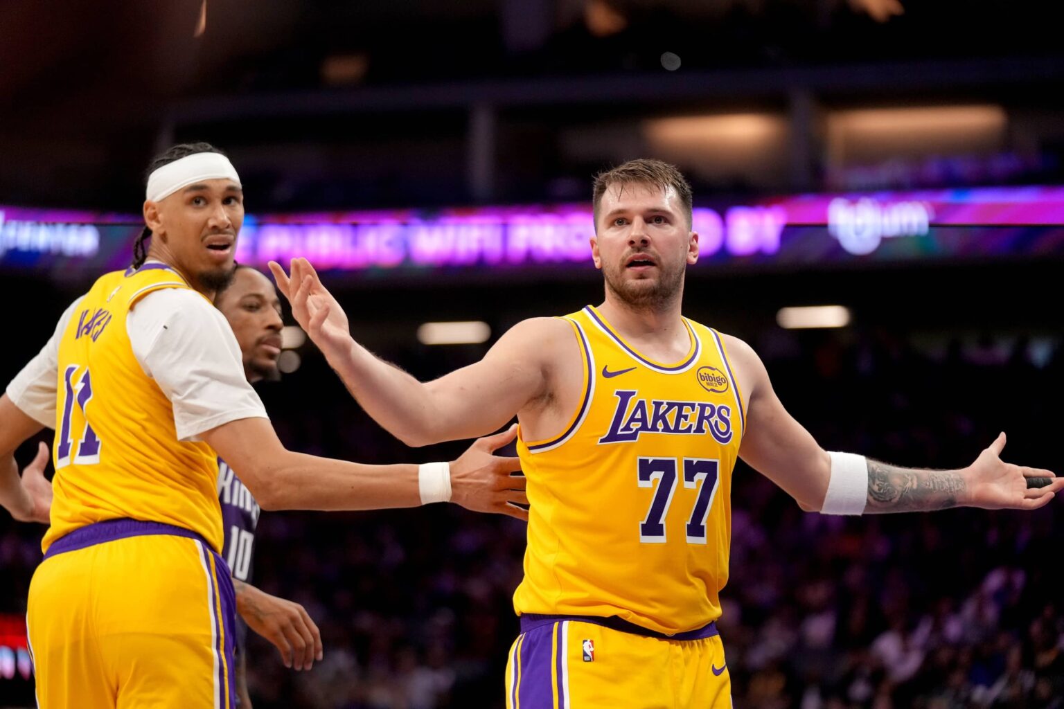 Sacramento, California, USA; Los Angeles Lakers guard Luka Doncic (77) looks towards an official after scoring a basket against the Sacramento Kings in the second quarter at the Golden 1 Center. Mandatory Credit: Cary Edmondson-Imagn Images