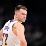 Dallas, Texas, USA; Los Angeles Lakers guard Luka Doncic (77) looks back during the second half against the Dallas Mavericks at the American Airlines Center. Mandatory Credit: Jerome Miron-Imagn Images