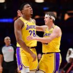 Los Angeles, California, USA; Los Angeles Lakers forward Rui Hachimura (28) reacts with guard Austin Reaves (15) after scoring a basket and drawing the foul against the Miami Heat during the second half at Crypto.com Arena. Mandatory Credit: Gary A. Vasquez-Imagn Images