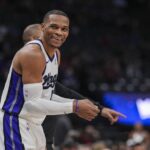 Sacramento, California, USA; Sacramento Kings guard Russell Westbrook (18) smiles during the second quarter Houston Rockets at Golden 1 Center. Mandatory Credit: Justine Willard-Imagn Images