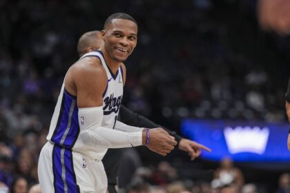 Sacramento, California, USA; Sacramento Kings guard Russell Westbrook (18) smiles during the second quarter Houston Rockets at Golden 1 Center. Mandatory Credit: Justine Willard-Imagn Images