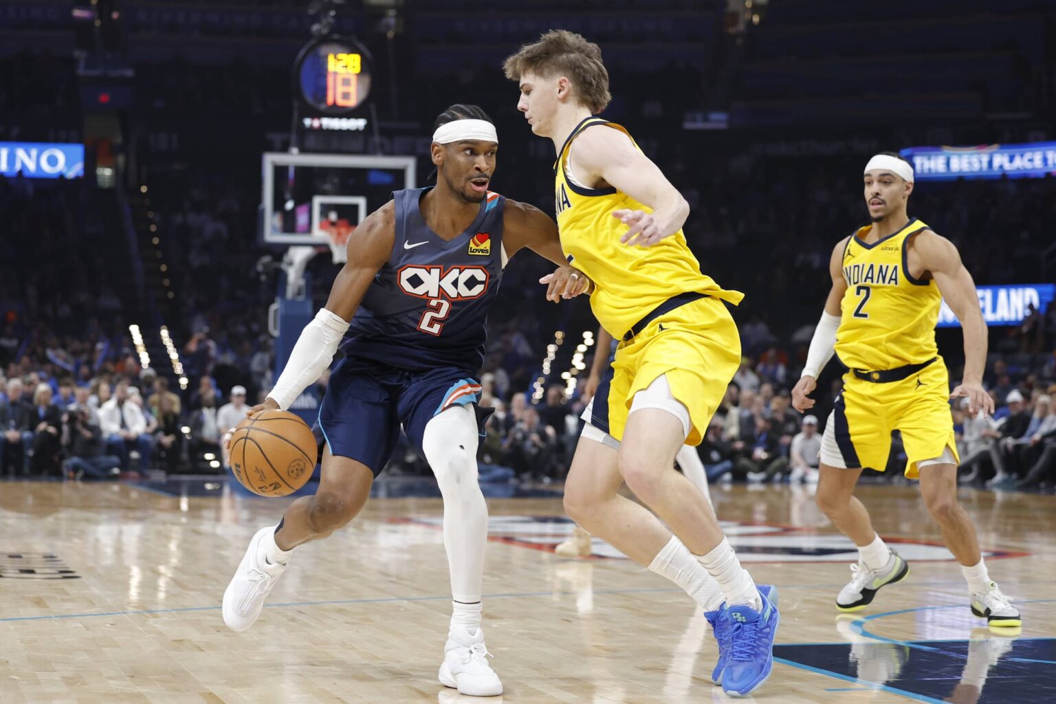 Oklahoma City, Oklahoma, USA; Oklahoma City Thunder guard Shai Gilgeous-Alexander (2) drives down the court against Indiana Pacers guard Johnny Furphy (12) during the second quarter at Paycom Center. Mandatory Credit: Alonzo Adams-Imagn Images