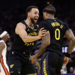 Jan 19, 2026; San Francisco, California, USA; Golden State Warriors guard Stephen Curry (30) celebrates with guard Gary Payton II (0) after Payton scored a basket against the Miami Heat during the third quarter at Chase Center. Mandatory Credit: Kelley L Cox-Imagn Images