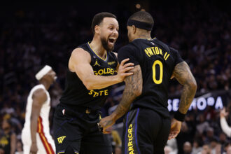 Jan 19, 2026; San Francisco, California, USA; Golden State Warriors guard Stephen Curry (30) celebrates with guard Gary Payton II (0) after Payton scored a basket against the Miami Heat during the third quarter at Chase Center. Mandatory Credit: Kelley L Cox-Imagn Images