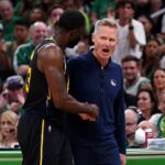 Boston, Massachusetts, USA; Golden State Warriors forward Draymond Green (23) talks with head coach Steve Kerr during the first quarter of game four in the 2022 NBA Finals against the Boston Celtics at the TD Garden. Mandatory Credit: David Butler II-Imagn Images