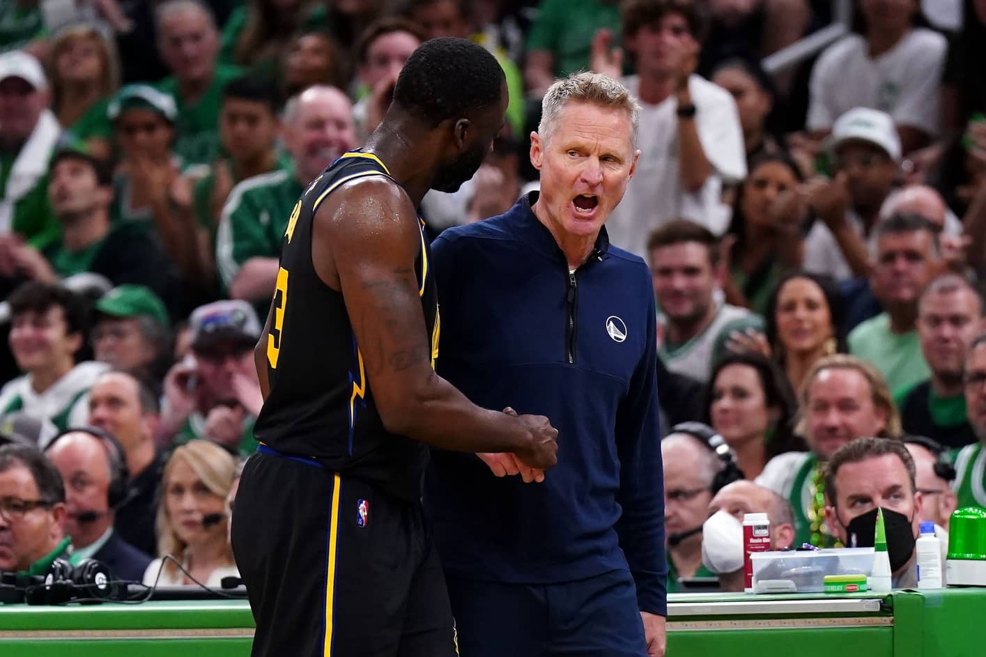 Boston, Massachusetts, USA; Golden State Warriors forward Draymond Green (23) talks with head coach Steve Kerr during the first quarter of game four in the 2022 NBA Finals against the Boston Celtics at the TD Garden. Mandatory Credit: David Butler II-Imagn Images