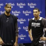 San Antonio, TX, USA; San Antonio Spurs power forward Tim Duncan (left) and shooting guard Danny Green (right) talk during practice before game 4 of the 2013 NBA Finals against the Miami Heat at AT&T Center. Mandatory Credit: Soobum Im-Imagn Images
