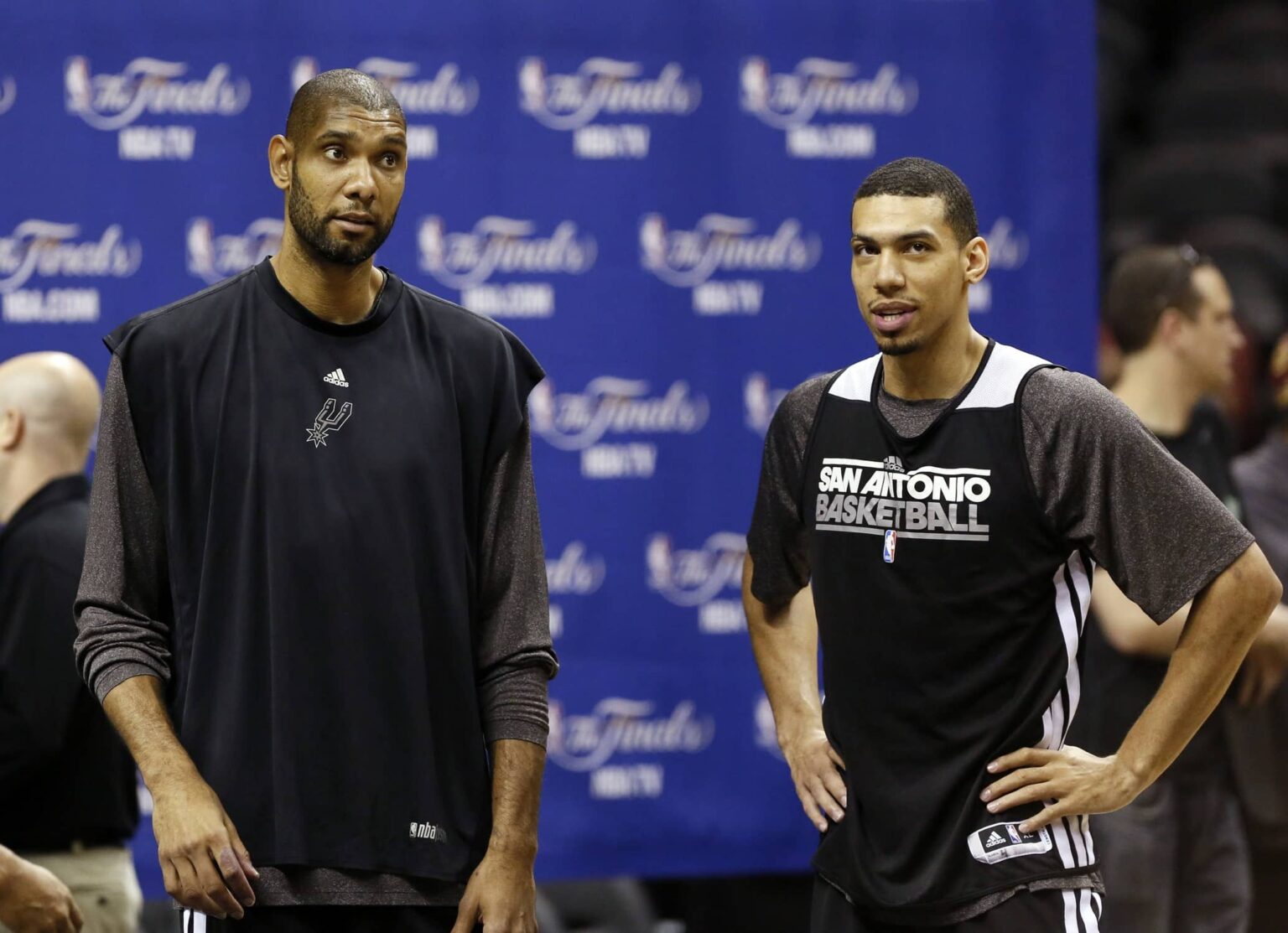 San Antonio, TX, USA; San Antonio Spurs power forward Tim Duncan (left) and shooting guard Danny Green (right) talk during practice before game 4 of the 2013 NBA Finals against the Miami Heat at AT&T Center. Mandatory Credit: Soobum Im-Imagn Images