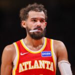 Atlanta, Georgia, USA; Atlanta Hawks guard Trae Young (11) in action against the New York Knicks in the third quarter at State Farm Arena. Mandatory Credit: Brett Davis-Imagn Images