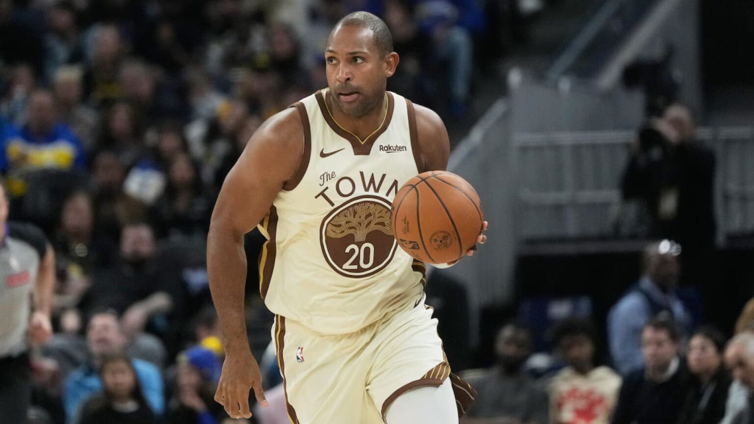 Golden State Warriors center Al Horford (20) brings the ball up the court against the Charlotte Hornets during the second half of an NBA basketball game in San Francisco, Saturday, Jan. 17, 2026. (AP Photo/Jeff Chiu)AP