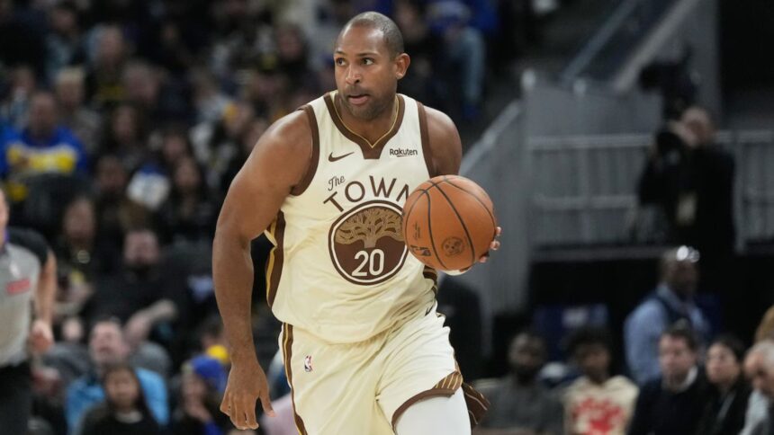Golden State Warriors center Al Horford (20) brings the ball up the court against the Charlotte Hornets during the second half of an NBA basketball game in San Francisco, Saturday, Jan. 17, 2026. (AP Photo/Jeff Chiu)AP