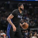 Dec 23, 2025; Dallas, Texas, USA; Dallas Mavericks forward Anthony Davis (3) brings the ball up court against the Denver Nuggets during the second half at the American Airlines Center. Mandatory Credit: Jerome Miron-Imagn Images