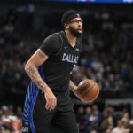 Dec 23, 2025; Dallas, Texas, USA; Dallas Mavericks forward Anthony Davis (3) brings the ball up court against the Denver Nuggets during the second half at the American Airlines Center. Mandatory Credit: Jerome Miron-Imagn Images