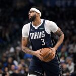Dec 12, 2025; Dallas, Texas, USA; Dallas Mavericks forward Anthony Davis (3) looks to pass the ball during the game between the Mavericks and the Nets at the American Airlines Center. Mandatory Credit: Jerome Miron-Imagn Images
