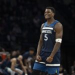 Feb 11, 2026; Minneapolis, Minnesota, USA; Minnesota Timberwolves guard Anthony Edwards (5) celebrates Minnesota Timberwolves forward Julius Randle (not pictured) making a shot against the Portland Trail Blazers in the second half at Target Center. Mandatory Credit: Jesse Johnson-Imagn Images