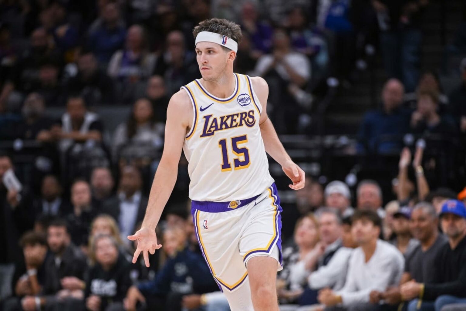 Oct 26, 2025; Sacramento, California, USA; Los Angeles Lakers guard Austin Reaves (15) reacts after making a three point shot against the Sacramento Kings during the fourth quarter at Golden 1 Center. Mandatory Credit: Ed Szczepanski-Imagn Images