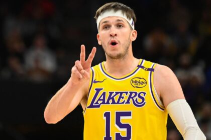 Austin Reaves calls out a play during a Lakers game. Mandatory Credit: Alex Goodlet -GettyImages