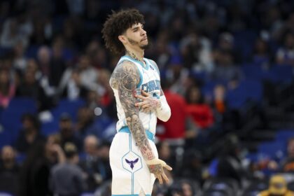 Jan 22, 2026; Orlando, Florida, USA; Charlotte Hornets guard LaMelo Ball (1) reacts after making a three-point basket against the Orlando Magic in the third quarter at Kia Center. Mandatory Credit: Nathan Ray Seebeck-Imagn Images