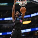 Feb 8, 2026; Washington, District of Columbia, USA; Miami Heat center Bam Adebayo (13) inks the ball against the Washington Wizards during the second quarter at Capital One Arena. Mandatory Credit: Rafael Suanes-Imagn Images