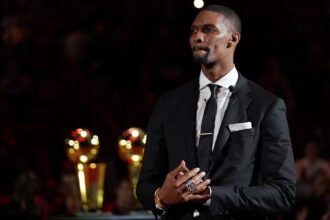 Mar 26, 2019; Miami, FL, USA; Former Miami Heat player Chris Bosh speaks during his jersey retirement ceremony at halftime of the game between the Miami Heat and the Orlando Magic at American Airlines Arena. Mandatory Credit: Jasen Vinlove-Imagn Images