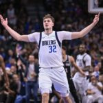 Feb 5, 2026; Dallas, Texas, USA; Dallas Mavericks forward Cooper Flagg (32) celebrates during the second half against the San Antonio Spurs at the American Airlines Center. Mandatory Credit: Jerome Miron-Imagn Images