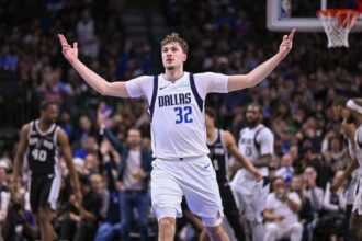 Feb 5, 2026; Dallas, Texas, USA; Dallas Mavericks forward Cooper Flagg (32) celebrates during the second half against the San Antonio Spurs at the American Airlines Center. Mandatory Credit: Jerome Miron-Imagn Images