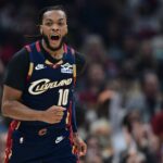 Nov 30, 2025; Cleveland, Ohio, USA; Cleveland Cavaliers guard Darius Garland (10) celebrates after making a three point basket during the first half at Rocket Arena. Mandatory Credit: David Dermer-Imagn Images