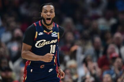 Nov 30, 2025; Cleveland, Ohio, USA; Cleveland Cavaliers guard Darius Garland (10) celebrates after making a three point basket during the first half at Rocket Arena. Mandatory Credit: David Dermer-Imagn Images