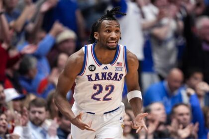 Jan 31, 2026; Lawrence, Kansas, USA; Kansas Jayhawks guard Darryn Peterson (22) reacts after scoring during the first half against the BYU Cougars at Allen Fieldhouse. Mandatory Credit: Jay Biggerstaff-Imagn Images