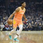 Dec 22, 2025; Cleveland, Ohio, USA; Cleveland Cavaliers forward De'Andre Hunter (12) dribbles the ball in the first quarter against the Charlotte Hornets at Rocket Arena. Mandatory Credit: David Richard-Imagn Images