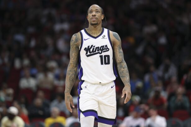 Feb 25, 2026; Houston, Texas, USA; Sacramento Kings guard DeMar DeRozan (10) looks up after a play during the third quarter against the Houston Rockets at Toyota Center. Mandatory Credit: Troy Taormina-Imagn Images