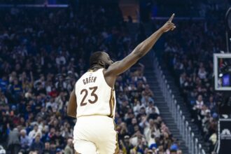 Jan 17, 2026; San Francisco, California, USA; Golden State Warriors forward Draymond Green (23) reacts after hitting a three-point shot against the Charlotte Hornets during the first quarter at Chase Center. Mandatory Credit: John Hefti-Imagn Images