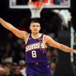 Jan 27, 2026; Phoenix, Arizona, USA; Phoenix Suns guard Grayson Allen (8) against the Brooklyn Nets at Mortgage Matchup Center. Mandatory Credit: Mark J. Rebilas-Imagn Images