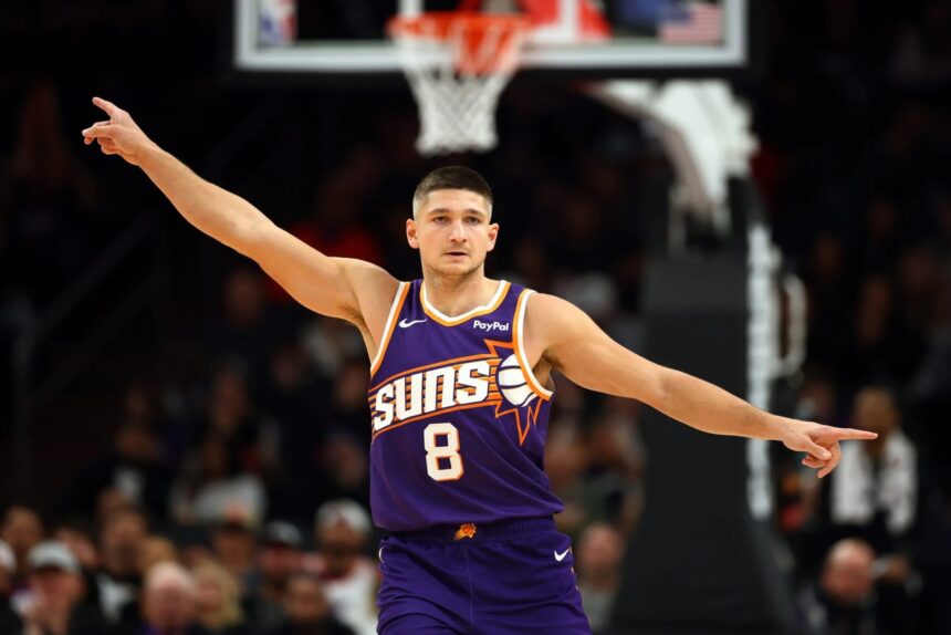 Jan 27, 2026; Phoenix, Arizona, USA; Phoenix Suns guard Grayson Allen (8) against the Brooklyn Nets at Mortgage Matchup Center. Mandatory Credit: Mark J. Rebilas-Imagn Images