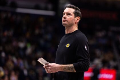Jan 6, 2026; New Orleans, Louisiana, USA; Los Angeles Lakers Head Coach JJ Redick looks on against the New Orleans Pelicans during the second half at Smoothie King Center. Mandatory Credit: Stephen Lew-Imagn Images