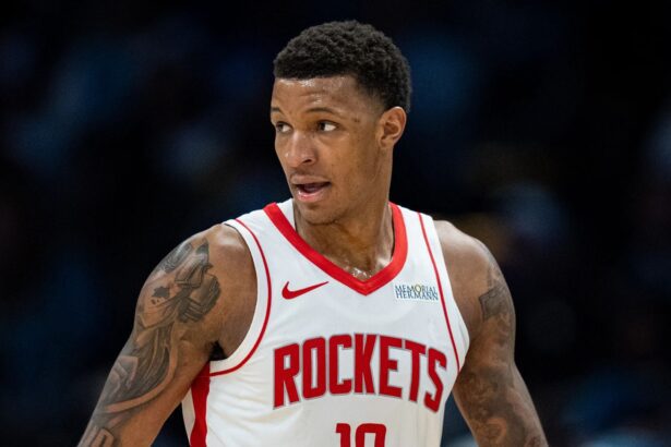 Jabari Smith Jr. reacts to a play during a Rockets game. Mandatory Credit: Jacob Kupferman - Getty Images