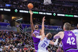 Feb 7, 2026; Orlando, Florida, USA; Utah Jazz center Jaren Jackson Jr. (20) goes to the basket against Orlando Magic forward Moritz Wagner (21) during the second half at Kia Center. Mandatory Credit: Mike Watters-Imagn Images