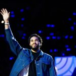 Oct 3, 2025; Durham, NC, USA; Jayson Tatum, NBA Boston Celtics Player helps coach alongside Duke Blue Devils head coach Jon Scheyer during the Countdown to Craziness at the Cameron Indoor Stadium. Mandatory Credit: Jaylynn Nash-Imagn Images