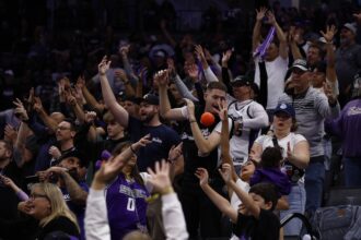 Sacramento Kings fans reach for a ball during a timeout against the Utah Jazz during the fourth quarter at Golden 1 Center.