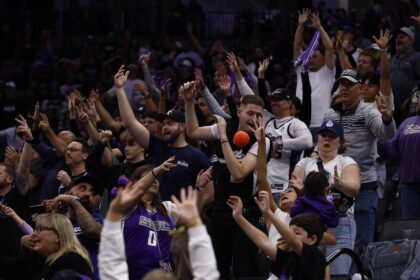 Sacramento Kings fans reach for a ball during a timeout against the Utah Jazz during the fourth quarter at Golden 1 Center.